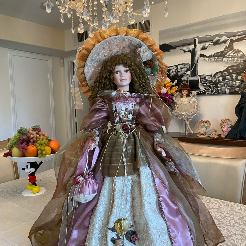 Elegant an Precious Porcelain Collection dolls 28”